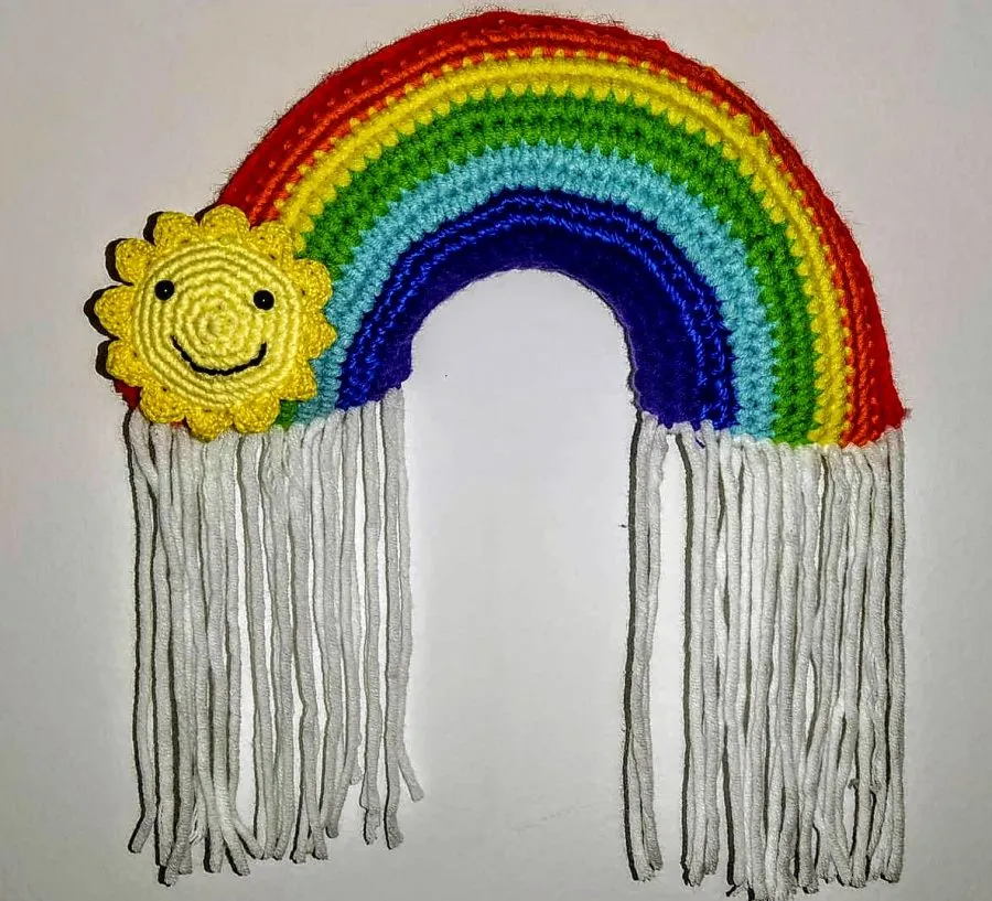 Patrón gratis arcoiris sol y lluvia