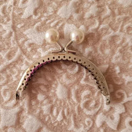 Boquilla broche perla